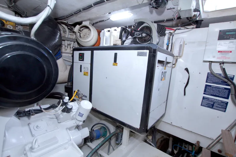 Slide: The Image of Engine room of 2005 Neptunus 62 Flybridge yacht with CAT generator and equipment. - 115