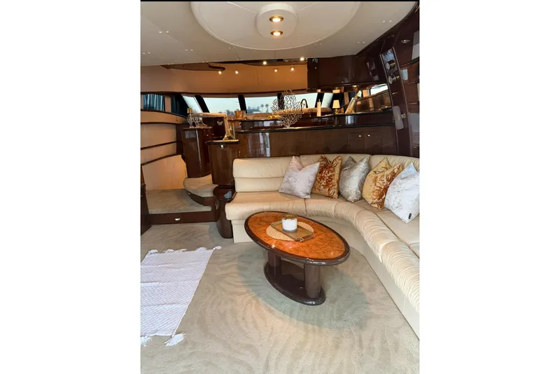 Slide: The Image of Luxurious interior of 2005 Neptunus 62 Flybridge yacht with elegant seating and decor. - 35