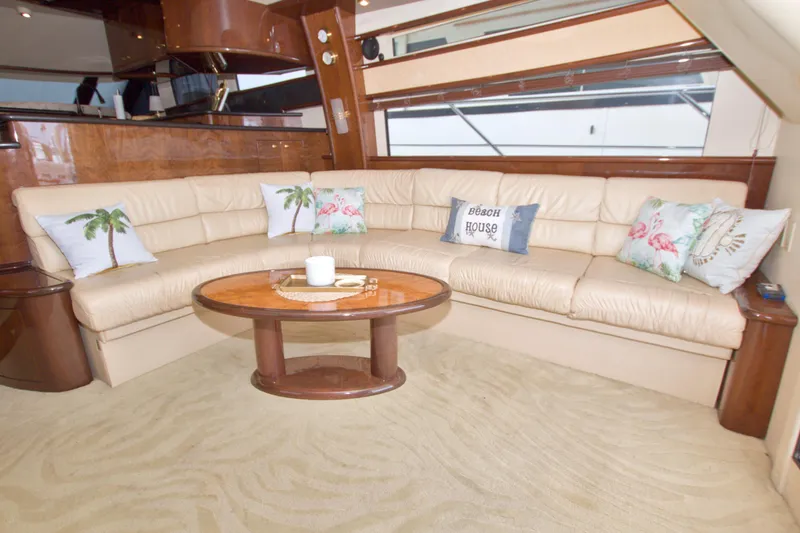 Slide: The Image of Luxurious 2005 Neptunus 62 Flybridge yacht interior with plush seating and decorative pillows. - 37