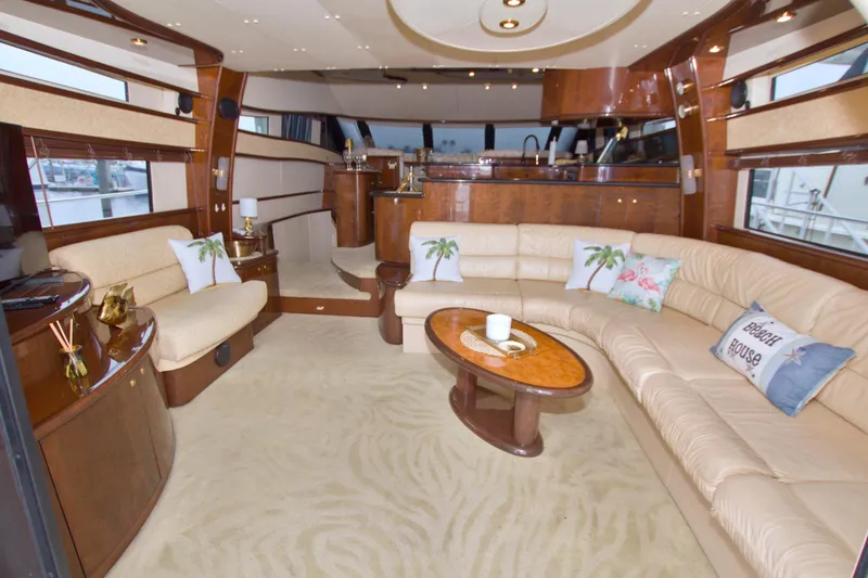 Slide: The Image of Luxurious interior of 2005 Neptunus 62 Flybridge yacht with elegant seating and decor. - 38