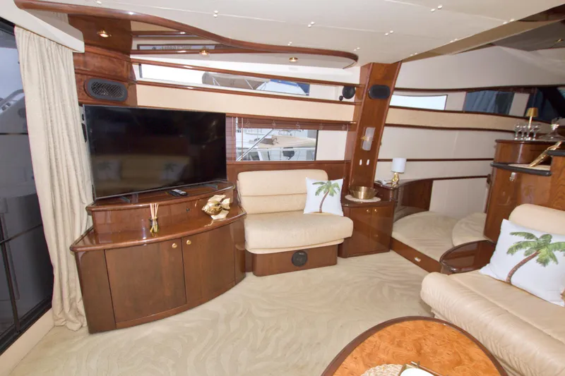Slide: The Image of Luxurious interior of 2005 Neptunus 62 Flybridge yacht with elegant wood finishes. - 39