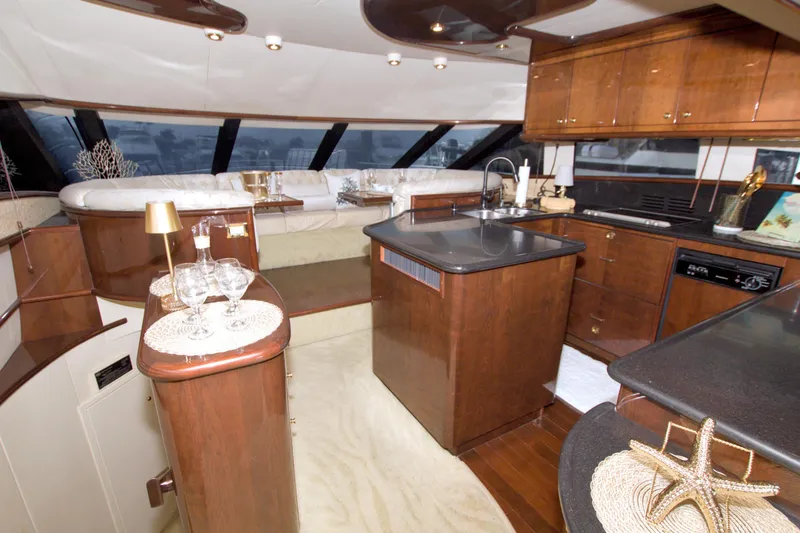 Slide: The Image of Luxurious interior of 2005 Neptunus 62 Flybridge yacht with elegant wood finishes. - 47