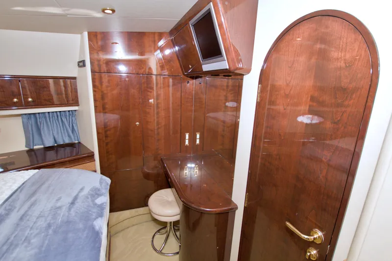 Slide: The Image of Luxurious 2005 Neptunus 62 Flybridge yacht interior with elegant wood finish. - 71