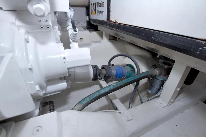 Slide: The Image of Engine compartment of 2005 Neptunus 62 Flybridge with CAT Marine Power components. - 94