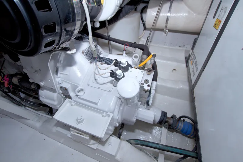 Slide: The Image of Engine room of 2005 Neptunus 62 Flybridge yacht, showcasing mechanical components. - 95