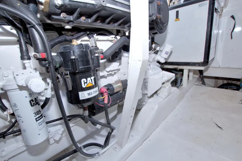 Slide: The Image of Engine room of 2005 Neptunus 62 Flybridge yacht with CAT components visible. - 98