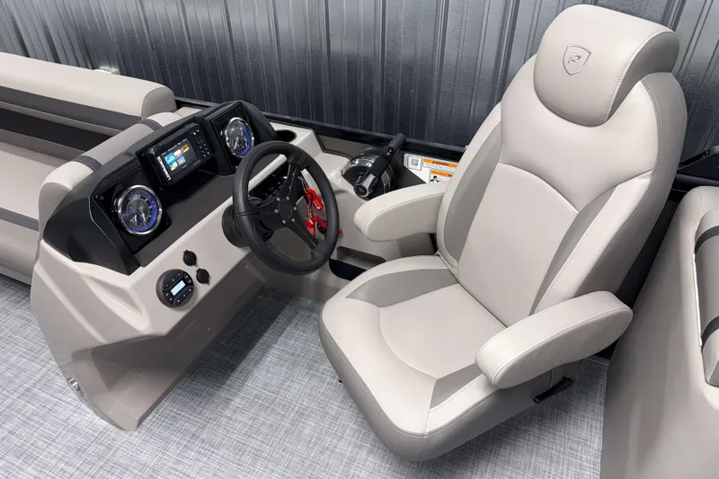Slide: The Image of Premier 220 Sunscape RF 2026 boat interior with modern dashboard and comfortable captain's chair. - 10
