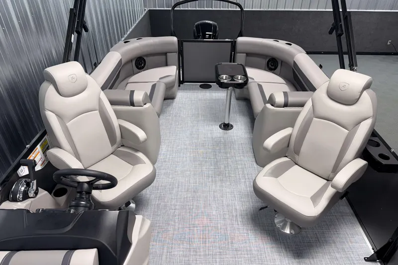 Slide: The Image of Luxurious interior of 2026 Premier 220 Sunscape RF pontoon boat with plush seating. - 13