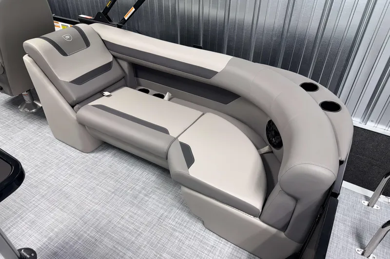 Slide: The Image of 2026 Premier 220 Sunscape RF boat interior with gray cushioned seating and cup holders. - 8