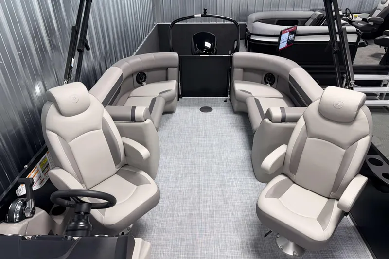 Slide: The Image of 2026 Premier 220 Sunscape RF Tritoon interior with luxurious seating and modern design. - 14