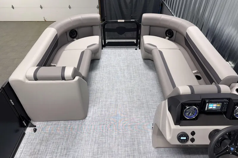 Slide: The Image of 2026 Premier 220 Sunscape RF Tritoon interior with luxurious seating and modern dashboard. - 15