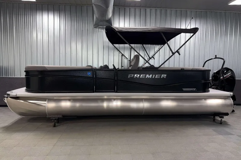 Slide: The Image of 2026 Premier 220 Sunscape RF Tritoon in showroom, featuring sleek design and modern amenities. - 3