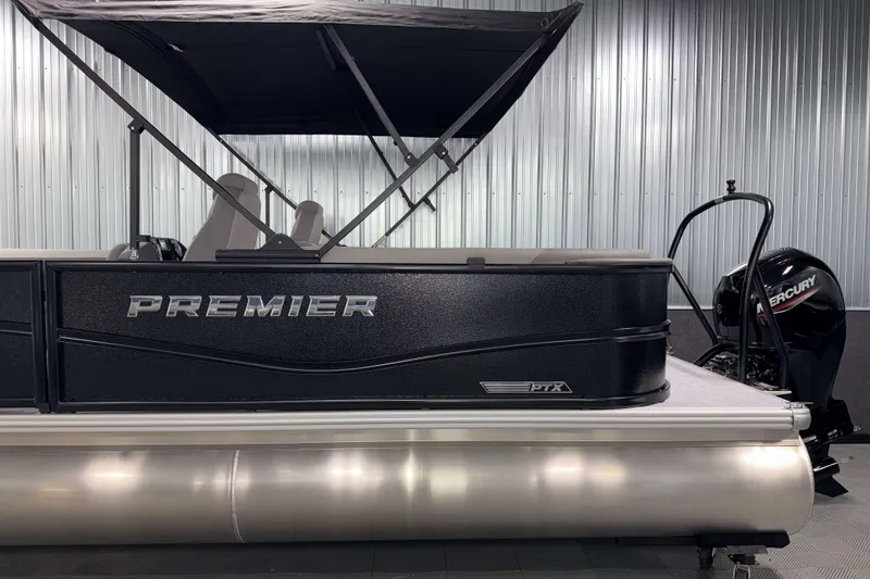 Slide: The Image of 2026 Premier 220 Sunscape RF Tritoon with Mercury engine in a showroom. - 5