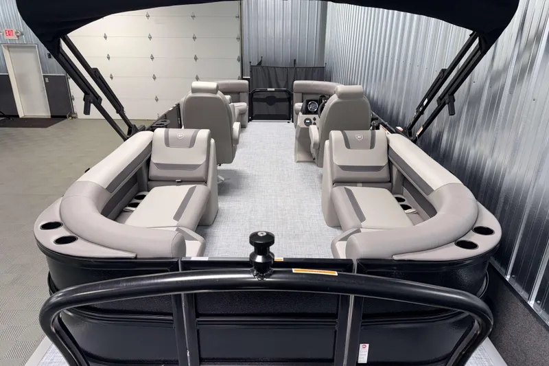 Slide: The Image of 2026 Premier 220 Sunscape RF Tritoon interior with luxurious seating and modern design. - 8