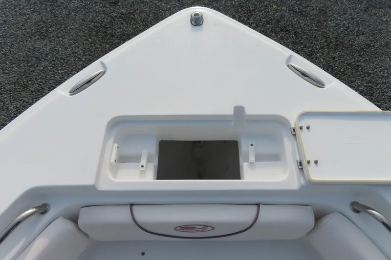 Slide: The Image of Bow of 2019 Sea Hunt Ultra 234 boat with storage compartment. - 13