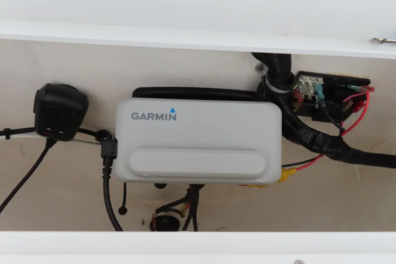 Slide: The Image of Garmin device installed in 2019 Sea Hunt Ultra 234 boat's electrical compartment. - 28