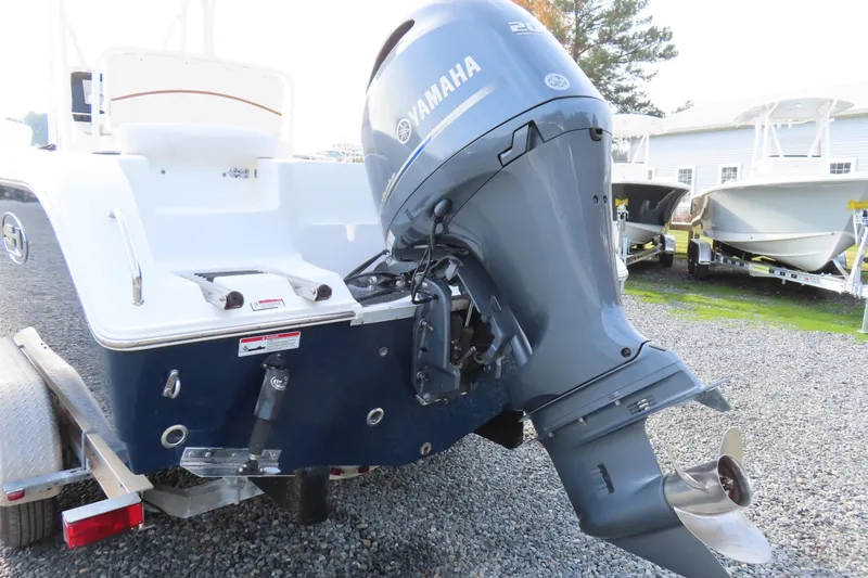 Slide: The Image of 2019 Sea Hunt Ultra 234 with Yamaha outboard motor on trailer. - 4