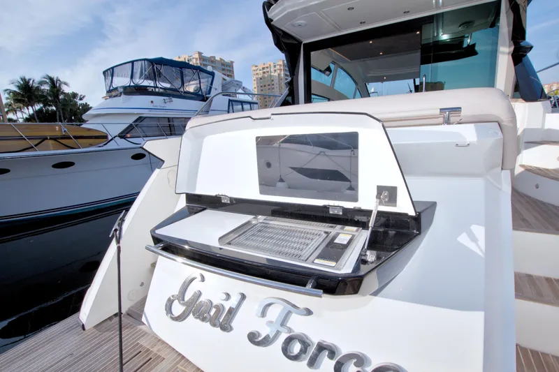 Slide: The Image of 2019 Beneteau Gran Turismo 50 yacht with outdoor grill and luxurious design. - 13