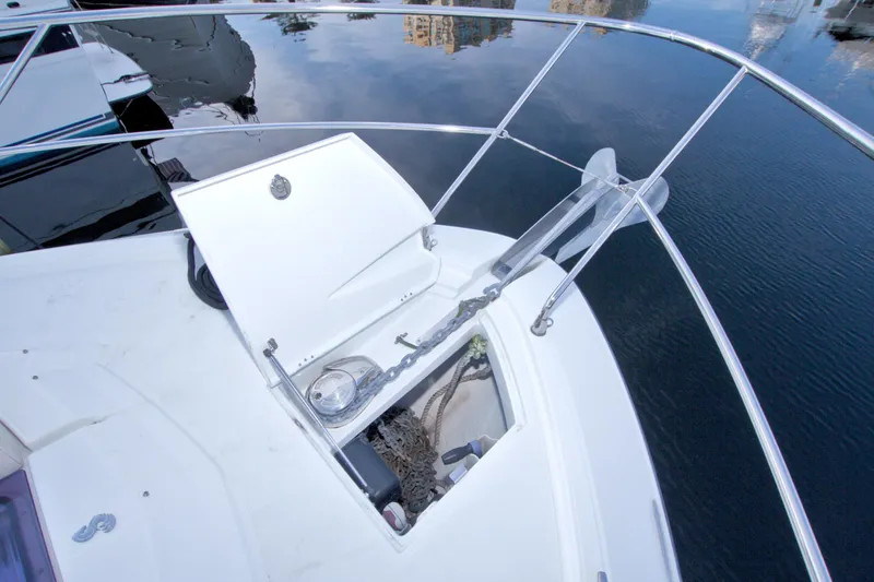 Slide: The Image of 2019 Beneteau Gran Turismo 50 yacht anchor system on calm water. - 21