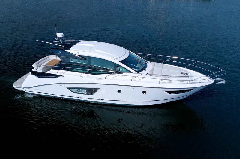 Slide: The Image of 2019 Beneteau Gran Turismo 50 yacht cruising on calm waters. - 4