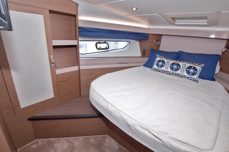 Slide: The Image of Luxurious cabin interior of 2019 Beneteau Gran Turismo 50 yacht with cozy bed and stylish decor. - 46