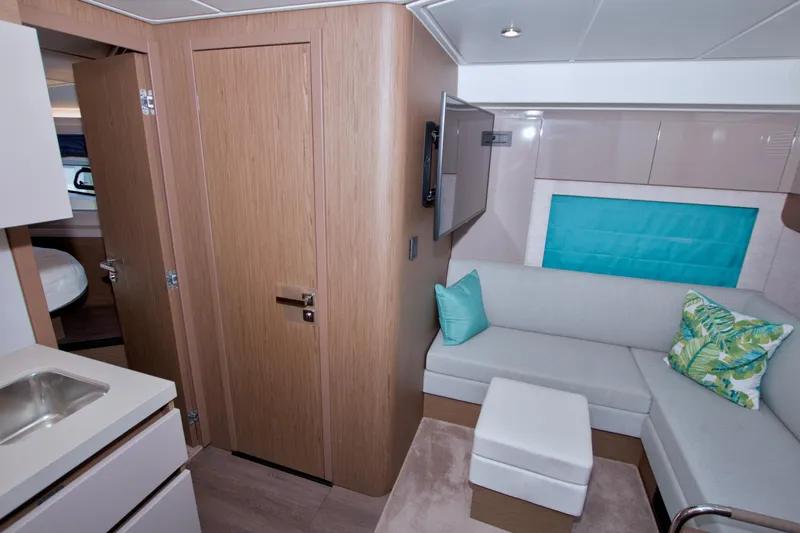 Slide: The Image of Interior of 2019 Beneteau Gran Turismo 50 yacht with modern seating and decor. - 50