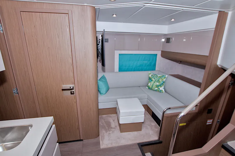 Slide: The Image of Luxurious interior of 2019 Beneteau Gran Turismo 50 yacht with modern seating and decor. - 55