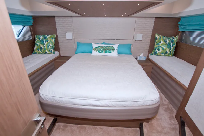 Slide: The Image of Luxurious bedroom interior of 2019 Beneteau Gran Turismo 50 yacht with modern decor. - 59