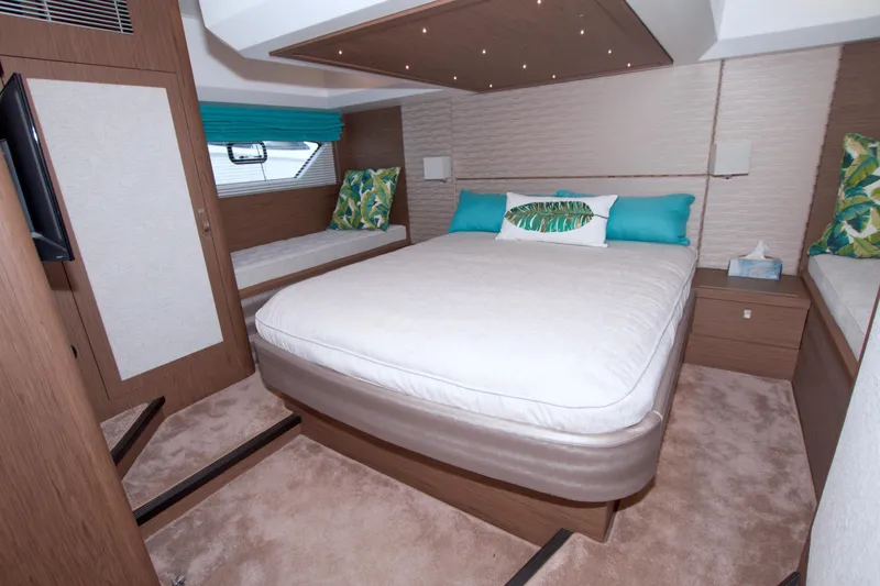 Slide: The Image of Luxurious bedroom interior of 2019 Beneteau Gran Turismo 50 yacht with modern decor. - 60