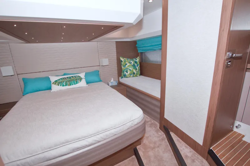 Slide: The Image of Luxurious bedroom interior of 2019 Beneteau Gran Turismo 50 yacht with modern decor. - 64