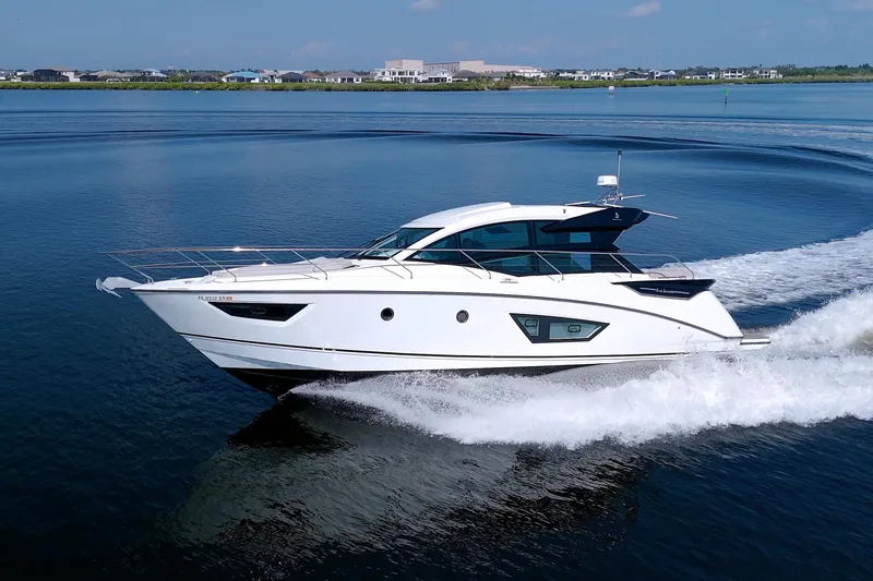 Slide: The Image of 2019 Beneteau Gran Turismo 50 yacht cruising on calm waters. - 8