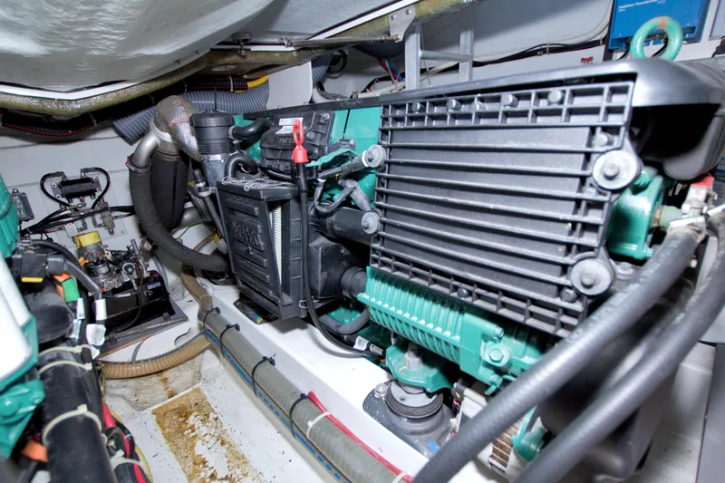 Slide: The Image of Engine room of 2019 Beneteau Gran Turismo 50 yacht, showcasing mechanical components. - 90