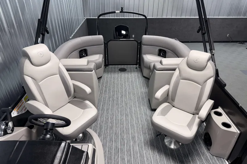 Slide: The Image of 2026 Premier 210 Sunsation RF Tritoon interior with luxurious seating and modern design. - 17