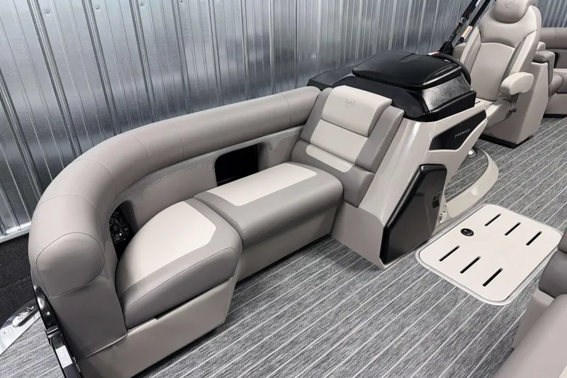 Slide: The Image of Luxurious interior of 2026 Premier 210 Sunsation RF Tritoon with plush seating and modern design. - 20