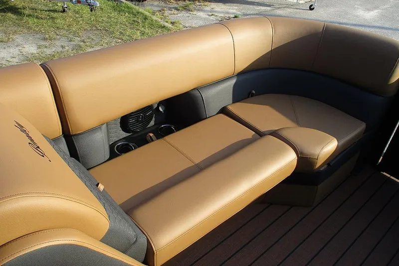 Slide: The Image of Luxurious seating on 2026 Bentley Pontoons Elite 223 Admiral, featuring tan leather upholstery. - 11