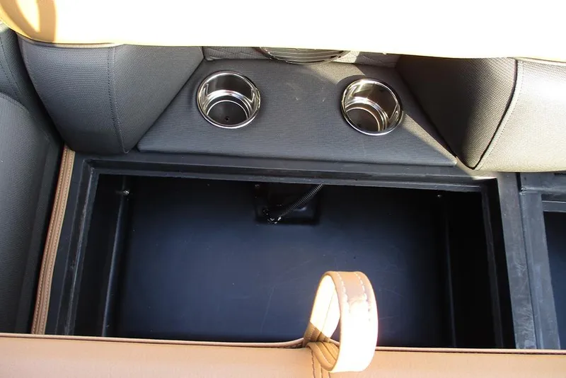 Slide: The Image of Interior storage compartment of 2026 Bentley Pontoons Elite 223 Admiral with cup holders. - 14
