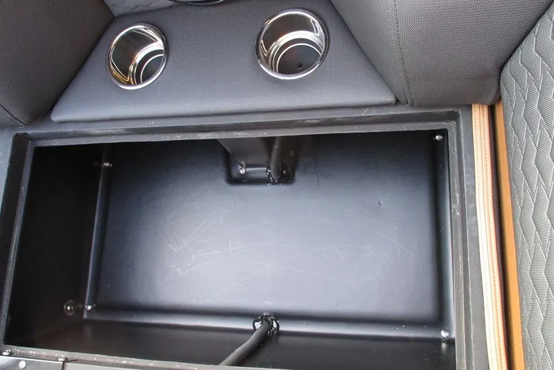 Slide: The Image of Storage compartment in 2026 Bentley Pontoons Elite 223 Admiral with cup holders. - 19