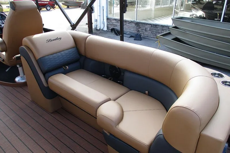 Slide: The Image of Luxurious seating on 2026 Bentley Pontoons Elite 223 Admiral boat, featuring tan upholstery. - 21