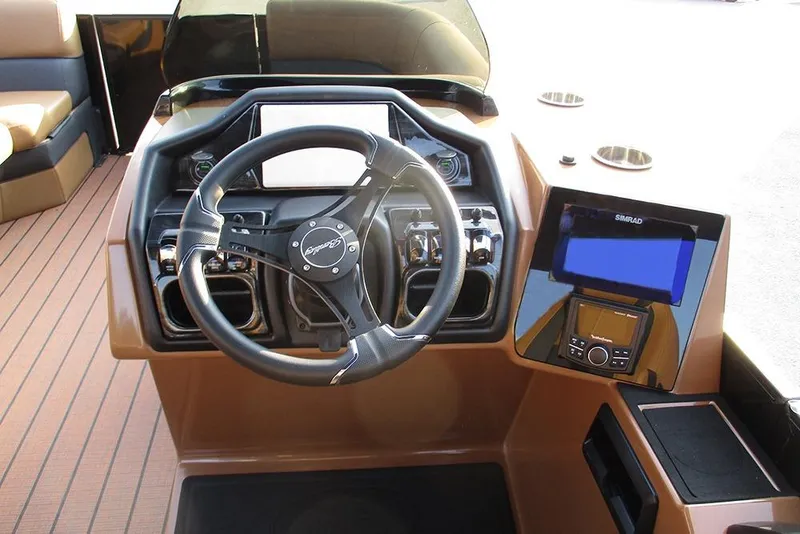 Slide: The Image of 2026 Bentley Pontoons Elite 223 Admiral dashboard with steering wheel and navigation system. - 32