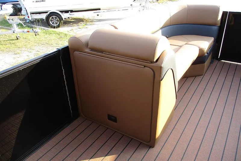 Slide: The Image of 2026 Bentley Pontoons Elite 223 Admiral interior with luxurious tan seating. - 34