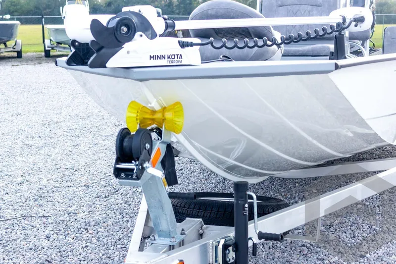 Slide: The Image of 2026 G3 Bay 21 GX boat with Minn Kota Terrova motor on a trailer. - 19