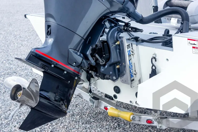 Slide: The Image of Outboard motor of 2026 G3 Bay 21 GX boat on a trailer. - 22