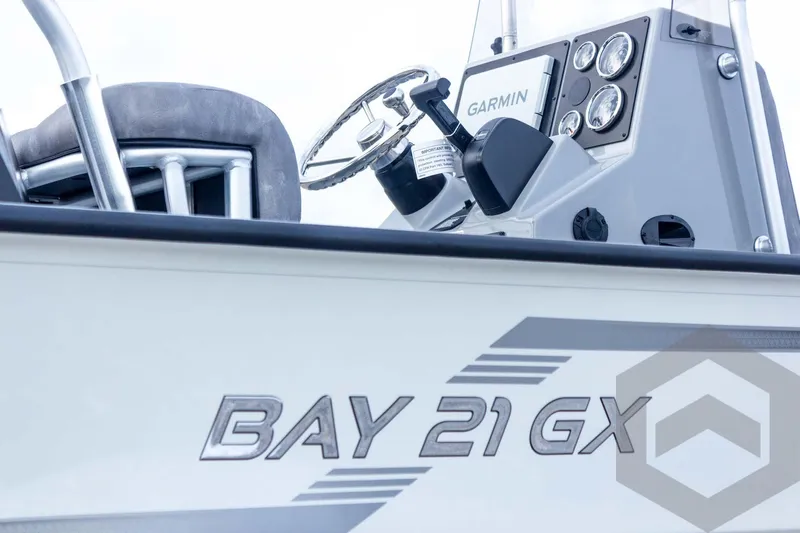 Slide: The Image of 2026 G3 Bay 21 GX boat dashboard with Garmin navigation system. - 23