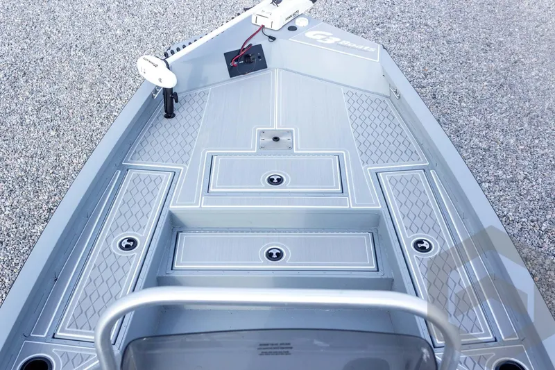 Slide: The Image of 2026 G3 Bay 21 GX boat deck with sleek, modern design and textured flooring. - 26