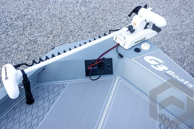 Slide: The Image of 2026 G3 Bay 21 GX boat deck with Minn Kota trolling motor. - 31
