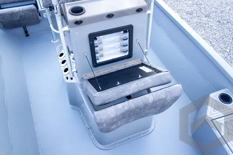 Slide: The Image of 2026 G3 Bay 21 GX boat interior with storage compartment and seating. - 37