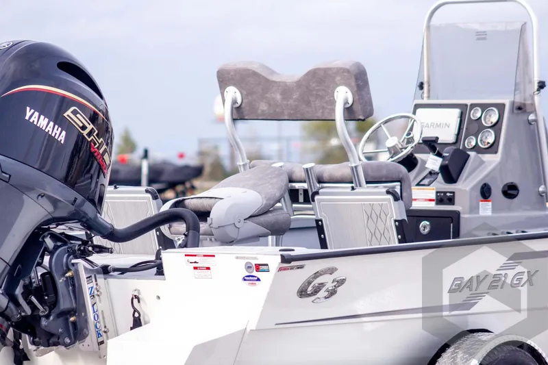 Slide: The Image of 2026 G3 Bay 21 GX boat with Yamaha engine and Garmin navigation system. - 4