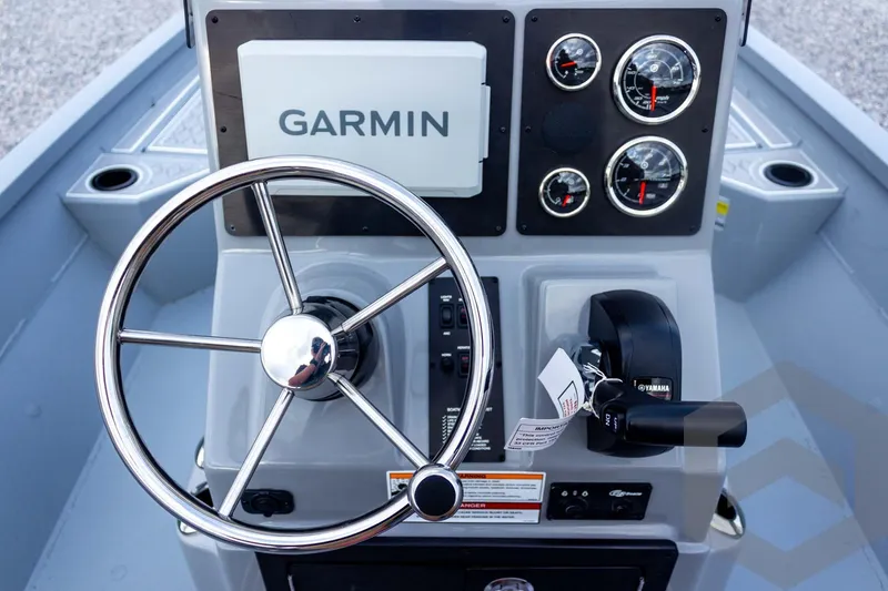 Slide: The Image of Steering console of 2026 G3 Bay 21 GX boat with Garmin navigation system. - 45