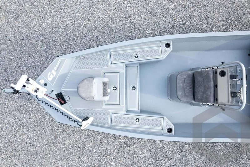 Slide: The Image of 2026 G3 Bay 21 GX boat, top view, featuring seating and deck details. - 55