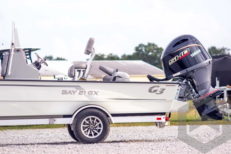 Slide: The Image of 2026 G3 Bay 21 GX boat with Yamaha motor on a trailer. - 8